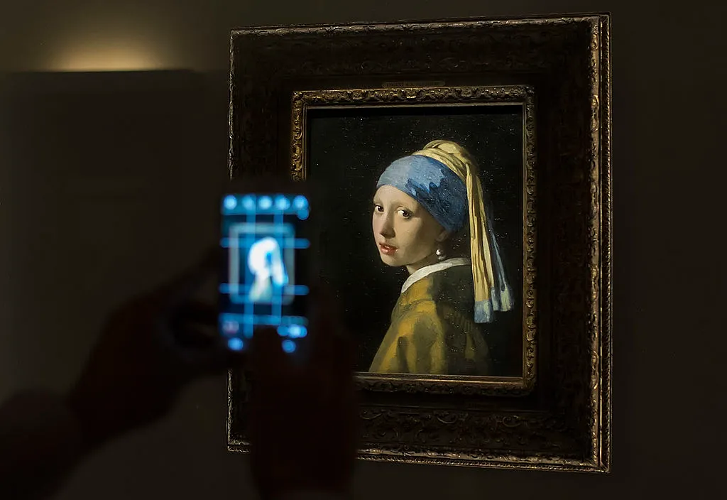 Court Decides Activists Who Glued Themselves to Vermeer Painting Don’t Deserve Jail Time