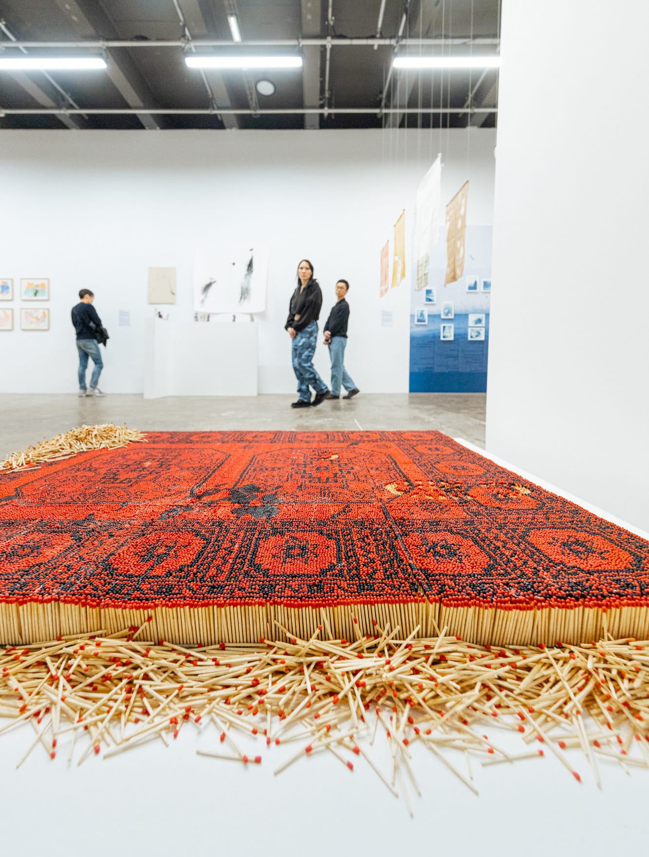 Hadi Rahnaward’s Fraying Rug of Charred and Pristine Matchsticks Crumbles Under Violence