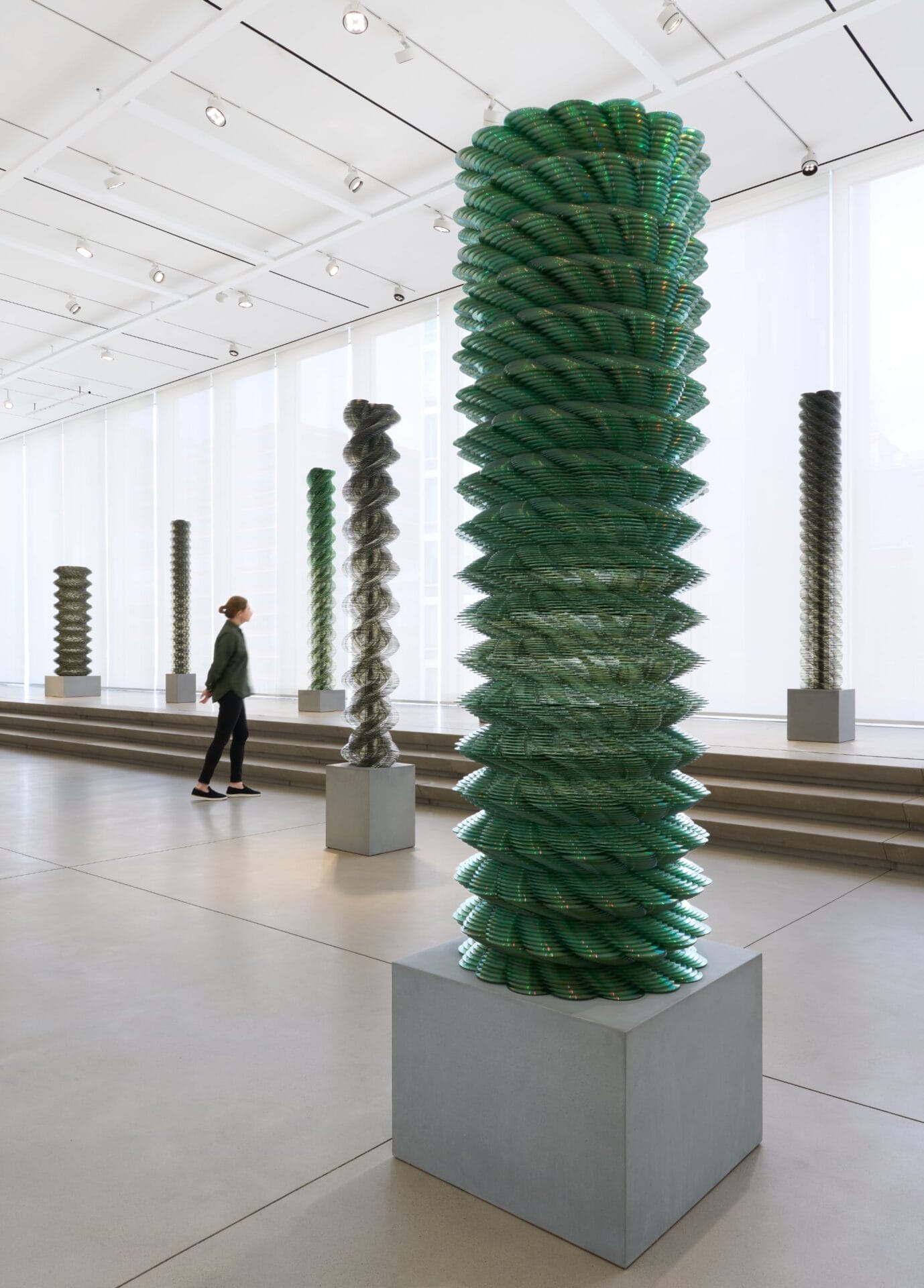 Tara Donovan Layers 200,000 CDs into Twisting Totems of Physical Data