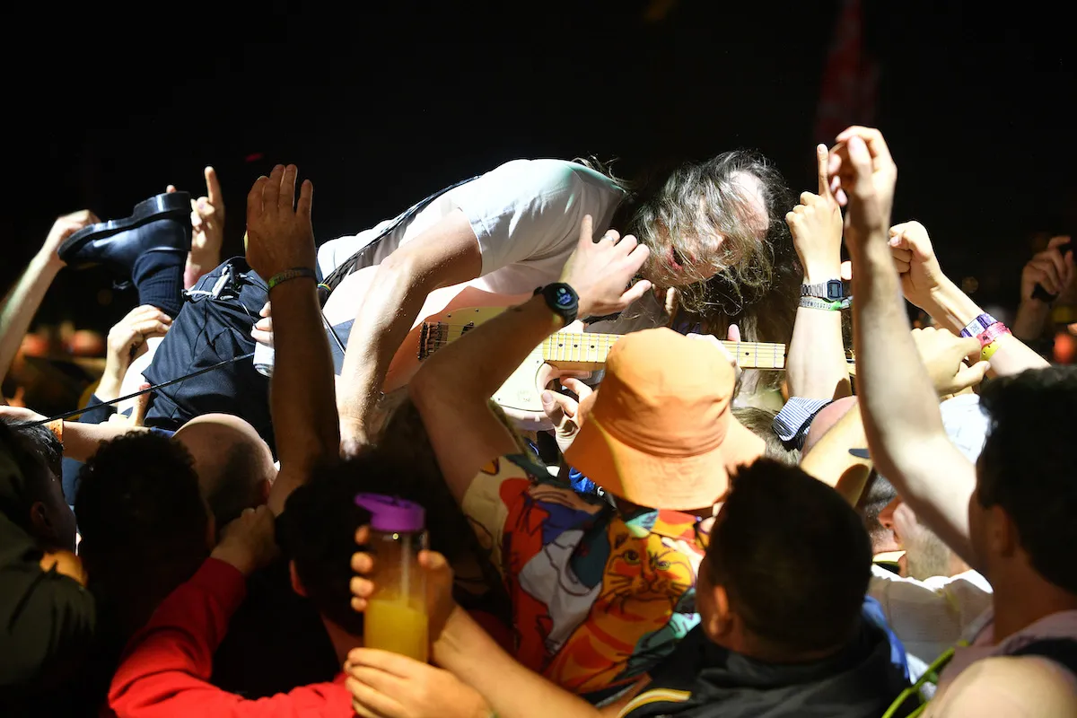 Banksy Sends Inflatable Migrant Raft into Glastonbury Crowd